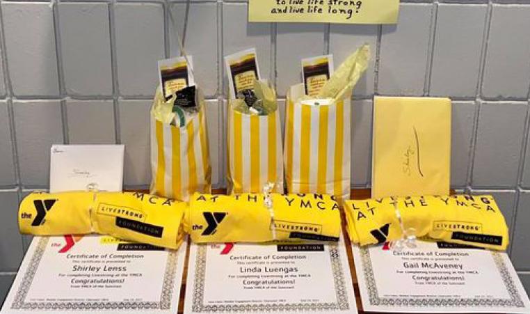 table with certificates and goody bags