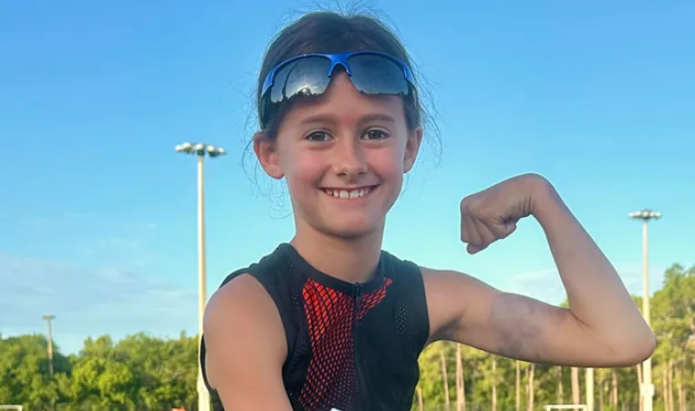 Youth participant in Kids Triathlon at the Greater Palm Harbor YMCA