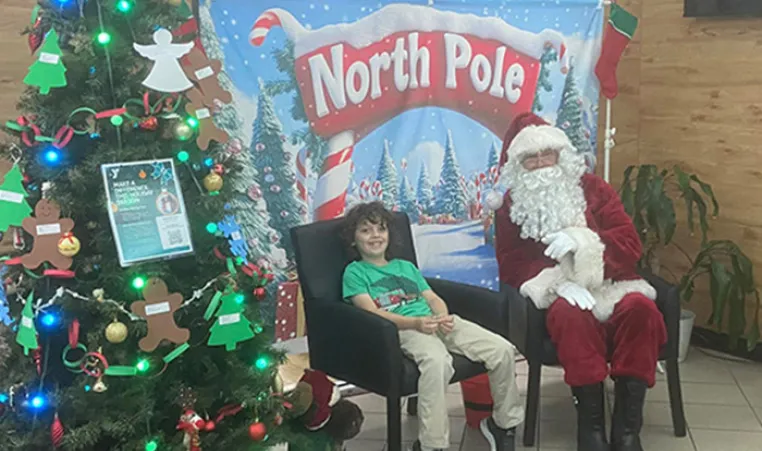 John Geigle YMCA member with Santa!