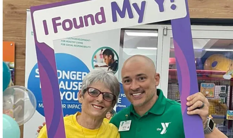 Seth Milbrand with a LiveStrong participant.