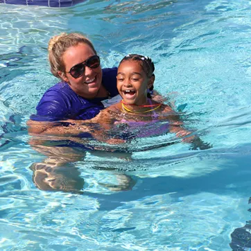 Instructor and child in pool for SAW