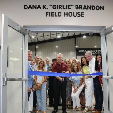 Ribbon-cutting: David Brandon (first from left) along with many community donors and supporters who made the facility possible.